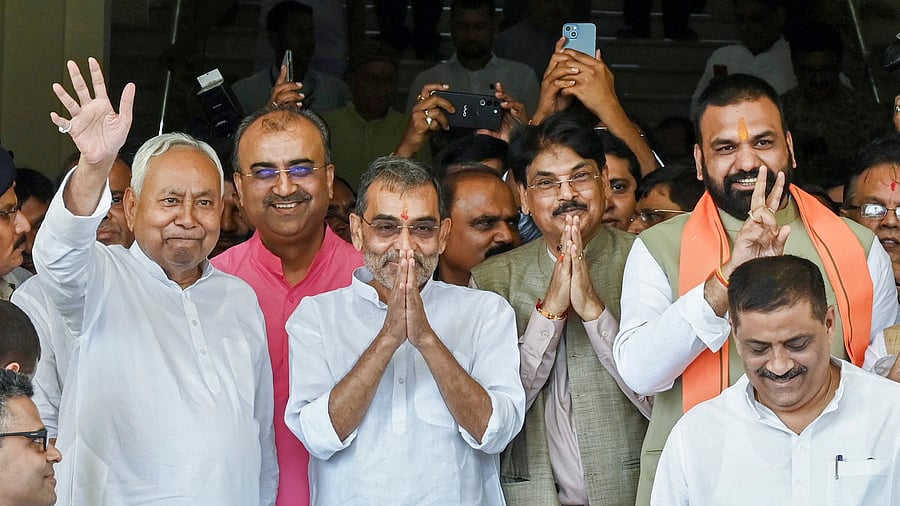 <div class="paragraphs"><p>Bihar Chief Minister Nitish Kumar with NDA candidate Upendra Kushwaha and Manan Kumar Mishra after they filed nomination paper for Rajya Sabha election at Bihar Vidhan Sabha, in Patna.</p></div>
