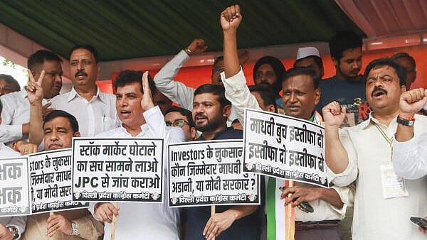 <div class="paragraphs"><p>Congress President Devender Yadav with party leaders Kanhaiya Kumar, Udit Raj and others during a ‘dharna’ demanding the resignation of Sebi chief Madhabi Buch, at Jantar Mantar, in New Delhi, Thursday, Aug. 22, 2024. </p></div>