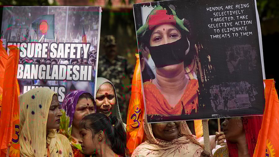<div class="paragraphs"><p>Members of Hindu organisations protest over the violence against minorities in Bangladesh, at  Jantar Mantar in New Delhi. </p></div>