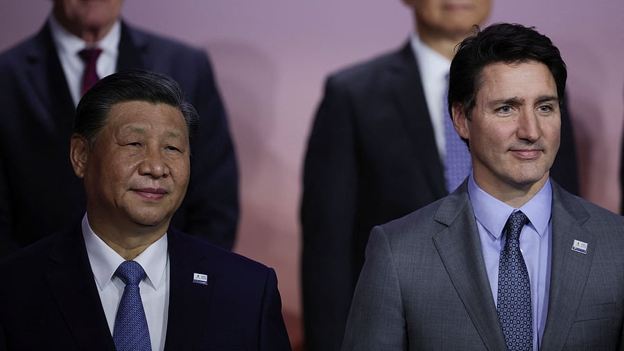 <div class="paragraphs"><p>Chinese President Xi Jinping and Canada's Prime Minister Justin Trudeau pose for a family photo during Asia-Pacific Economic Cooperation CEO Summit in San Francisco, California, US November 16, 2023. </p></div>