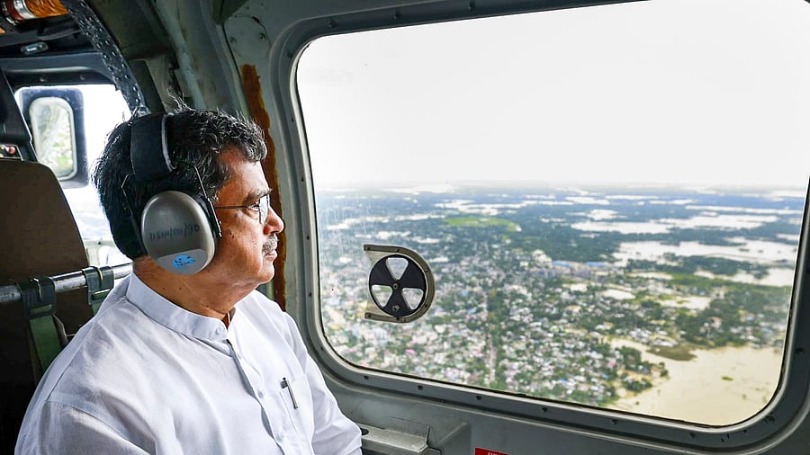 <div class="paragraphs"><p> Tripura Chief Minister Manik Saha takes stock of the flood situation in Tripura from a chopper.</p></div>