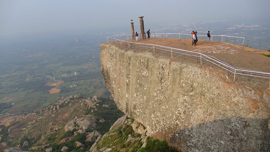 <div class="paragraphs"><p>Two stone pillars at the pinnacle of Shivagange hill; (below) a hero stone at Kambalu village.</p></div>