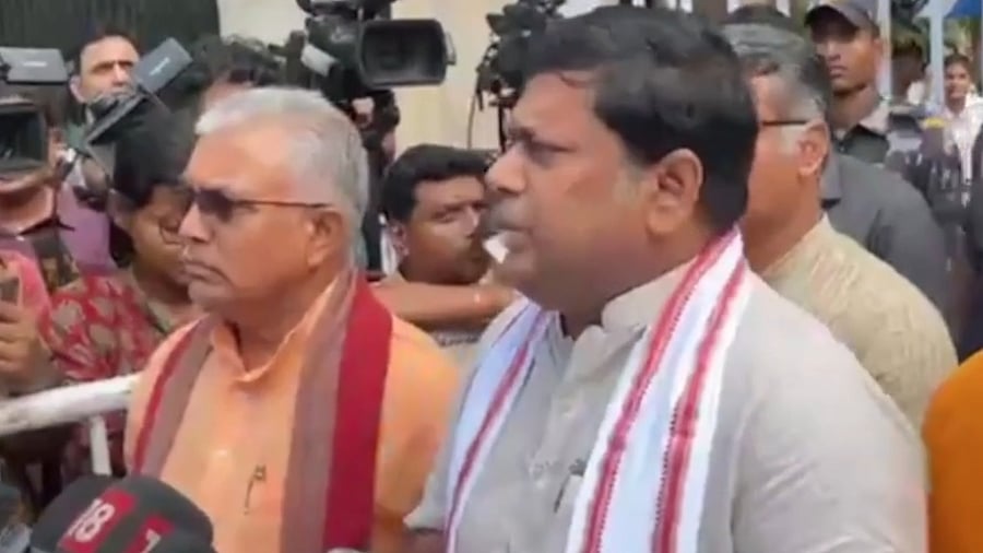 <div class="paragraphs"><p>Dilip Ghosh (right) with other leaders after the meeting.&nbsp;</p></div>