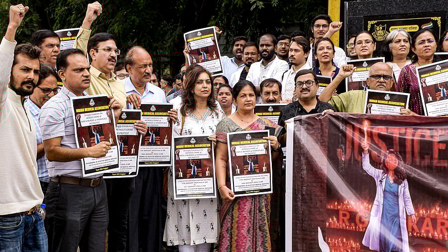 <div class="paragraphs"><p>Members of the Indian Medical Association (IMA) and Maharashtra State Association of Resident Doctors (MARD) stage a protest amid IMA's 24-hour nationwide strike demanding justice for the woman doctor who was allegedly raped and murdered at Kolkata's R G Kar Medical College and Hospital.</p></div>