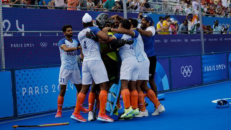 <div class="paragraphs"><p>Jarmanpreet Singh of India celebrates with teammates after winning the match against Great Britain, August 4, 2024.</p></div>