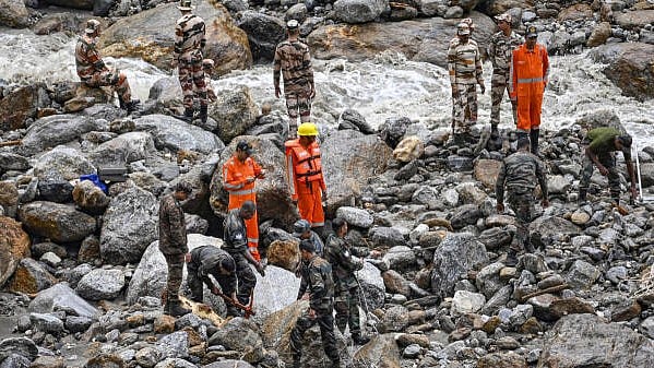 <div class="paragraphs"><p>Army and NDRF personnel carry out a search and rescue operation after a cloudburst at Samej village, in Rampur area of Shimla district.&nbsp;</p></div>