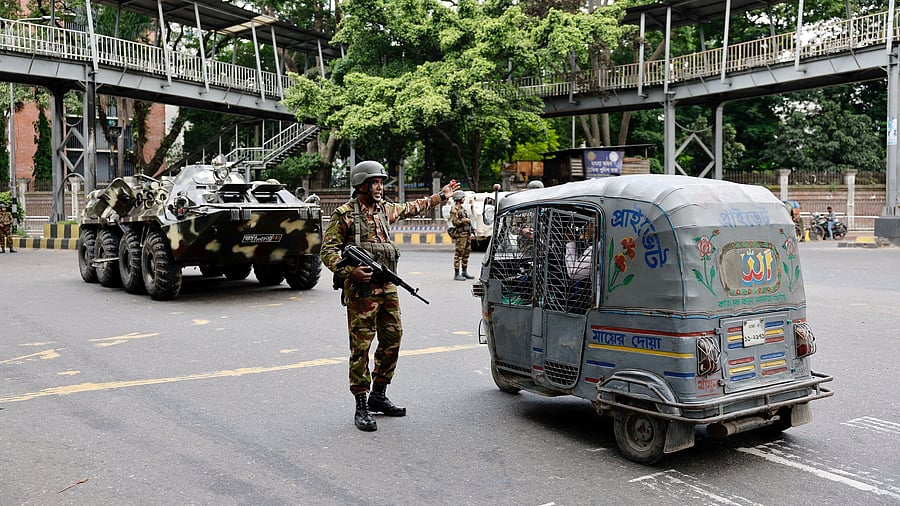 <div class="paragraphs"><p>Members of the Bangladesh Army are seen on duty in Dhaka.</p></div>