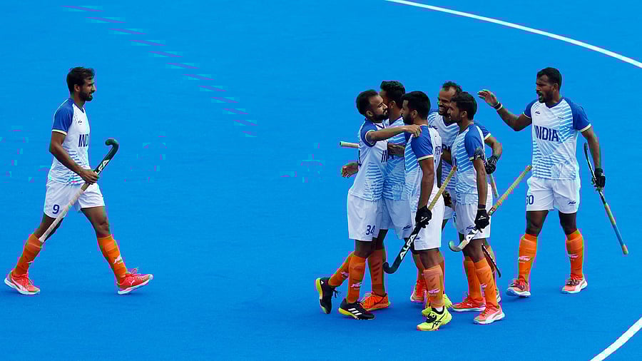 <div class="paragraphs"><p> Gurjant Singh of India, Sukhjeet Singh of India and Amit Rohidas of India celebrate with teammates their second goal in match against Australia.</p></div>