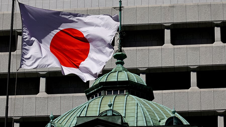 <div class="paragraphs"><p>The Japanese national flag waves at the Bank of Japan building in Tokyo.</p></div>