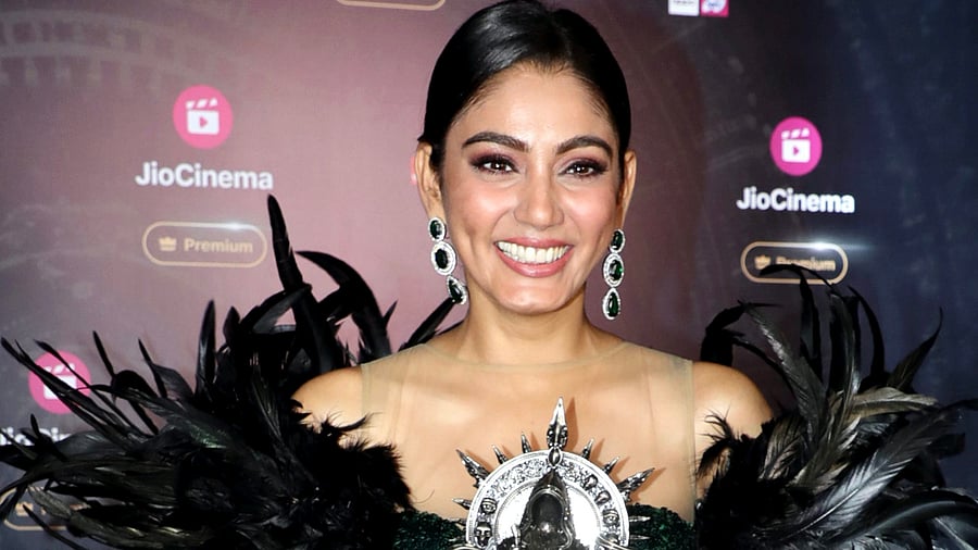 <div class="paragraphs"><p>Big Boss OTT Season 3 winner Sana Makbul poses with the trophy after the reality show's grand finale.</p></div>