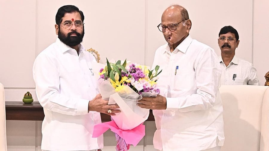 <div class="paragraphs"><p>Chief Minister and Shiv Sena leader Eknath Shinde (L) with NCP (SP) supremo Sharad Pawar. </p></div>