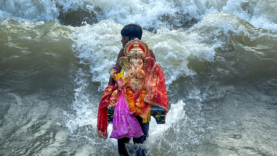 <div class="paragraphs"><p>A Ganpati idol being immersed in water. (Representative image)</p></div>