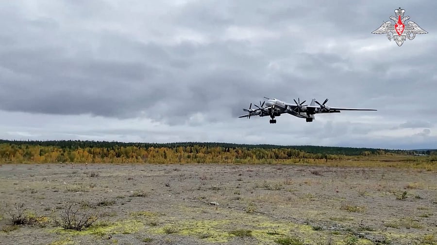 <div class="paragraphs"><p>Russian strategic bomber lands at an airfield in this still image taken from video.</p></div>