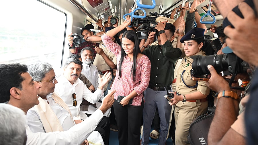 <div class="paragraphs"><p>Chief Minister Siddaramaiah interacts with commuters during a metro ride from KR Puram to Vidhana Soudha on Thursday. </p></div>