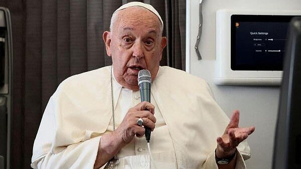 <div class="paragraphs"><p>Pope Francis holds a news conference aboard the papal plane on his flight back after his 12-day journey across Southeast Asia and Oceania, September 13, 2024.</p></div>