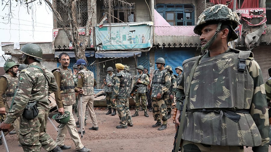 <div class="paragraphs"><p>File photo of police standing guard in a riot-affected area following clashes between people demonstrating for and against a new citizenship law in New Delhi, 2020. </p></div>