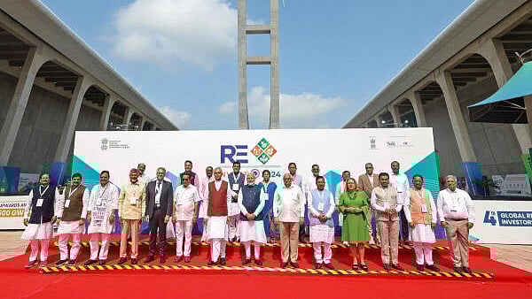 <div class="paragraphs"><p>Prime Minister Narendra Modi with Gujarat Governor Acharya Devvrat, Union Minister of New & Renewable Energy Pralhad Joshi, Gujarat CM Bhupendra Patel, Madhya Pradesh CM Mohan Yadav, Rajasthan CM Bhajanlal Sharma, Andhra Pradesh CM N. Chandrababu Naidu, Goa CM Pramod Sawant, Chhattisgarh CM Vishnu Deo Sai and other dignitaries during the 4th Global Renewable Energy Investors Meet and Expo. </p></div>