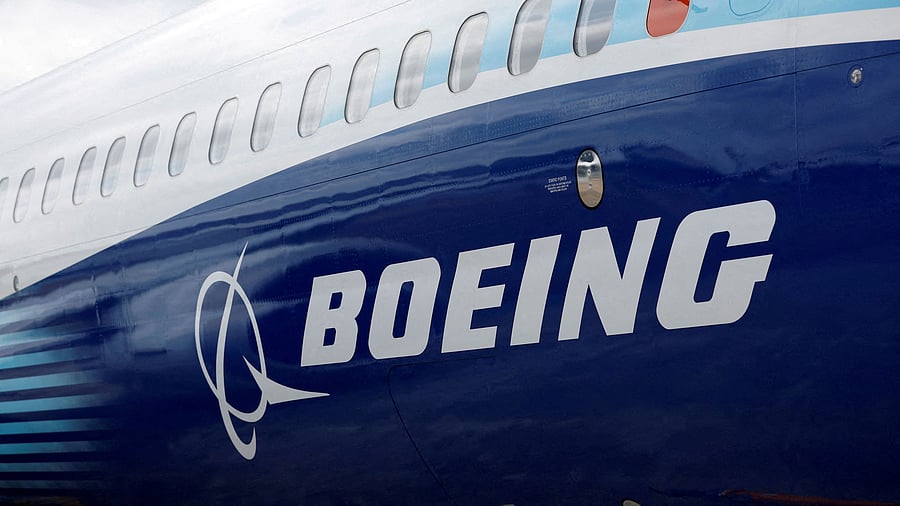 <div class="paragraphs"><p>The Boeing logo is seen on the side of a Boeing 737 MAX at the Farnborough International Airshow, in Farnborough, Britain, July 20, 2022. </p></div>
