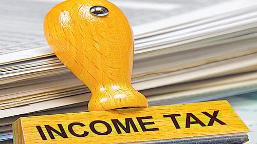<div class="paragraphs"><p>Illustration showing a stamper with words 'Income Tax'. For representational purposes.</p></div>