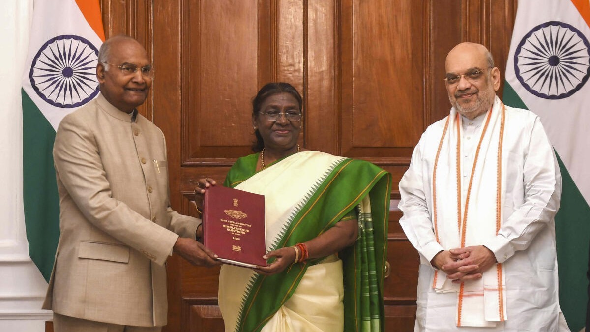 <div class="paragraphs"><p>President Droupadi Murmu being presented a report on simultaneous elections in the country by former president Ram Nath Kovind who heads High-Level Committee (HLC) on 'One Nation, One Election', and Home Minister Amit Shah, at Rashtrapati Bhavan.</p></div>