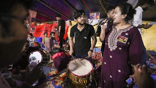 <div class="paragraphs"><p>Junior doctors continue to protest against the RG Kar Hospital rape and murder incident, at their 'dharna' site near Swasthya bhawan in Kolkata. </p></div>