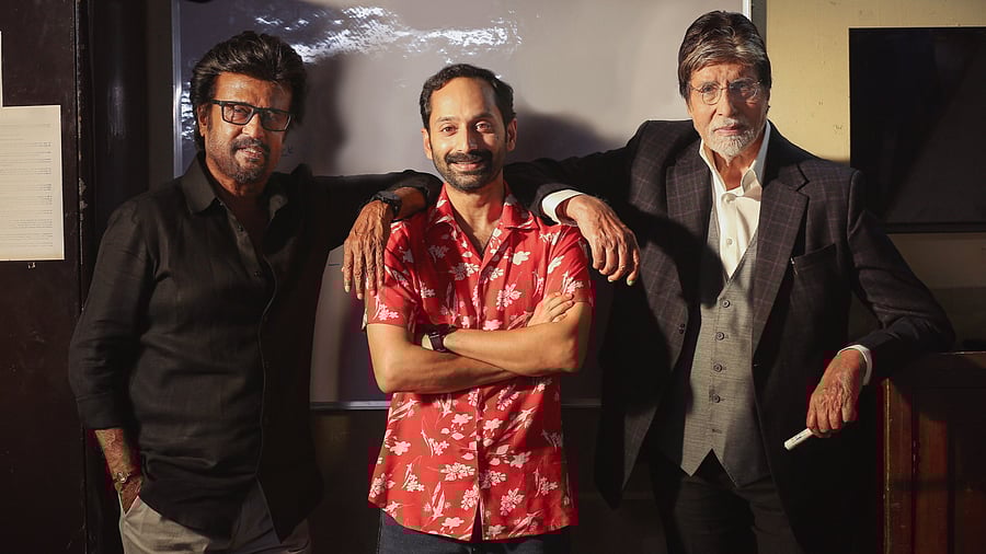 <div class="paragraphs"><p>Fahadh Faasil flanked by Amitabh Bachchan and Rajinikanth on the sets of&nbsp;<em>Vettaiyan</em>.</p></div>