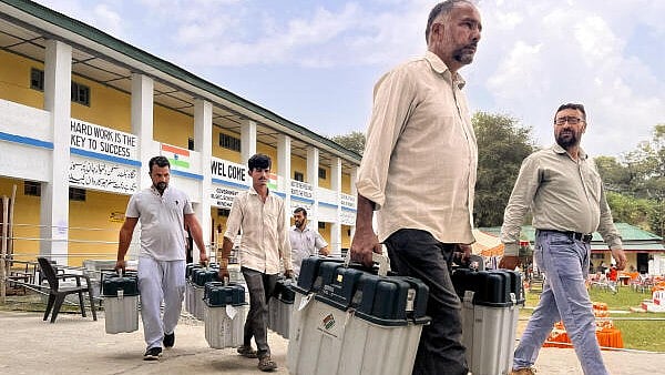 <div class="paragraphs"><p>Electronic Voting Machines (EVMs) and other election material being shifted to the counting centre from a strong room, a day after voting in the second phase of J&K Assembly elections</p></div>