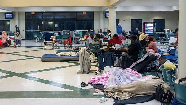 <div class="paragraphs"><p>People taking shelter from Hurricane Helene in Florida.</p></div>