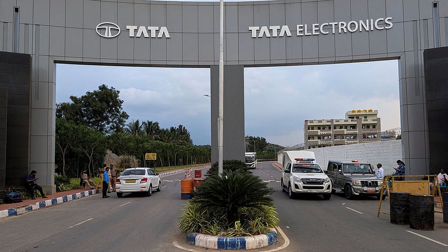 <div class="paragraphs"><p>FILE PHOTO: Vehicles pass through the security check at the entrance of a Tata Electronics plant which makes Apple iPhone components in Hosur, Tamil Nadu, India, Sept. 28, 2024. </p></div>
