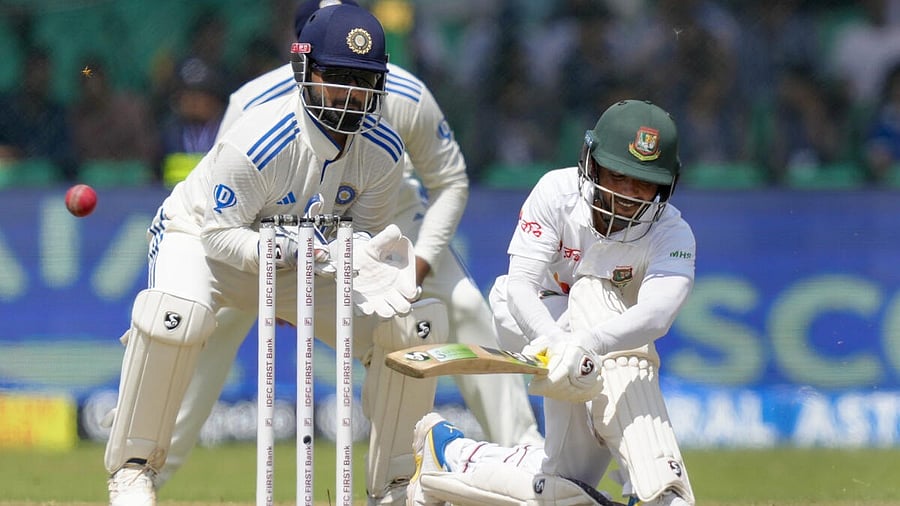 <div class="paragraphs"><p>Mominul Haque plays a sweep shop during his century against India in the second cricket Test at Kanpur. </p></div>