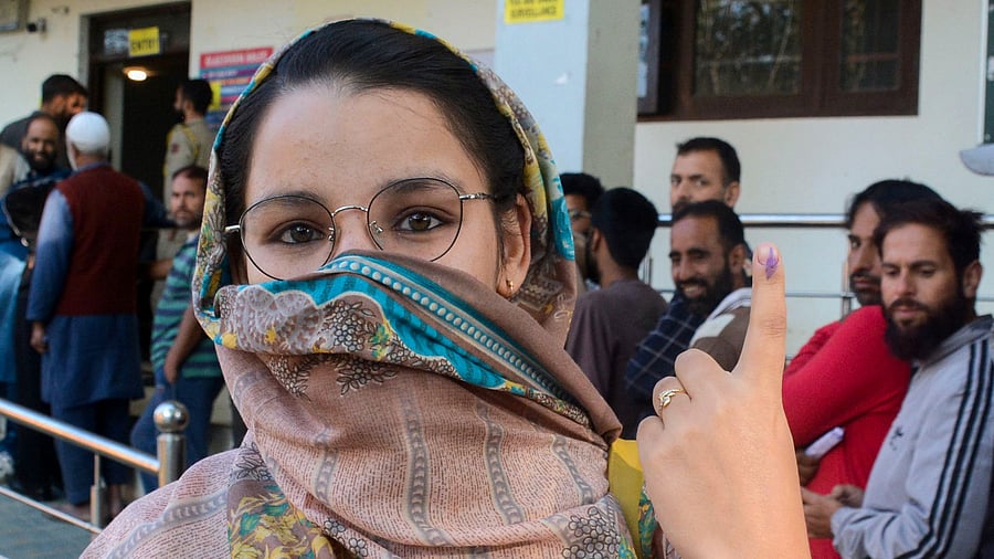 <div class="paragraphs"><p>A woman shows her inked finger after casting her vote at a polling booth during the third and final phase of Jammu & Kashmir Assembly elections, at Tangmarg in Baramulla district.</p></div>