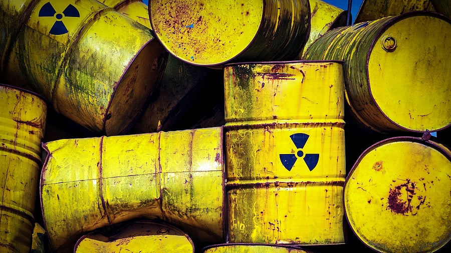 <div class="paragraphs"><p>Representative image showing abandoned drums with radioactive warning symbol.</p></div>
