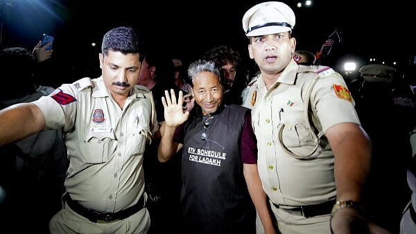 <div class="paragraphs"><p>Climate activist Sonam Wangchuk being taken by police personnel after he along with other Ladakhis, was brought to Rajghat on Gandhi Jayanti, in New Delhi, Wednesday, Oct 2, 2024.</p></div>