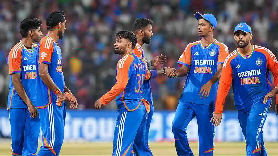 <div class="paragraphs"><p>Arshdeep Singh celebrates with teammates after taking the wicket of Bangladesh.</p></div>