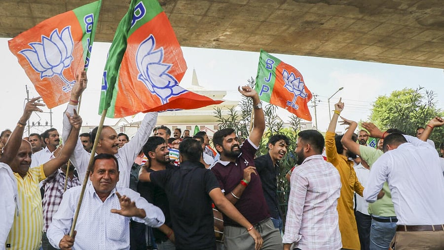 <div class="paragraphs"><p>BJP supporters celebrate party candidate Surinder Bhagat's win in Jammu on Tuesday. </p></div>