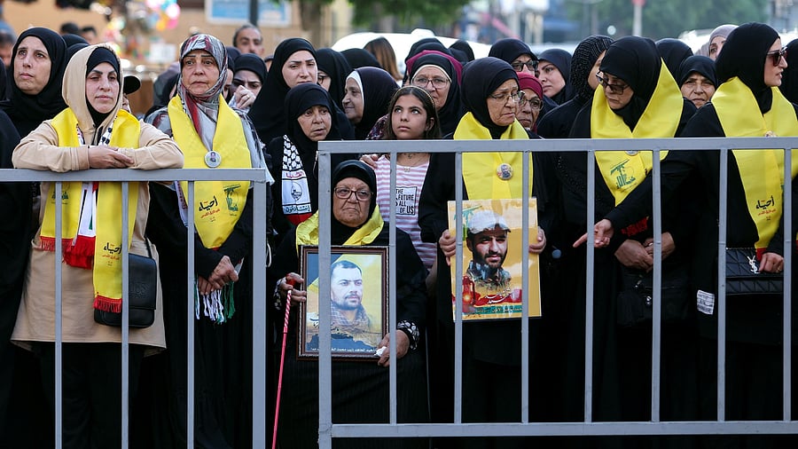 <div class="paragraphs"><p>Mothers of Hezbollah members, who were killed while fighting, gather to commemorate the annual Hezbollah Martyrs' Day and to express solidarity with the Palestinians in Gaza amid the ongoing conflict between Israel and Hamas, in Sidon, Lebanon. </p></div>