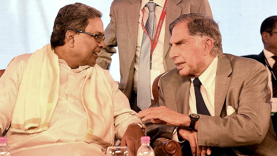 <div class="paragraphs"><p> In this March 2, 2016 file photo, Karnataka Chief Minister Siddaramaiah talks to industrialist Ratan Tata at the inauguration of Invest Karnataka 2016, a global investors' meet, in Bengaluru. </p></div>