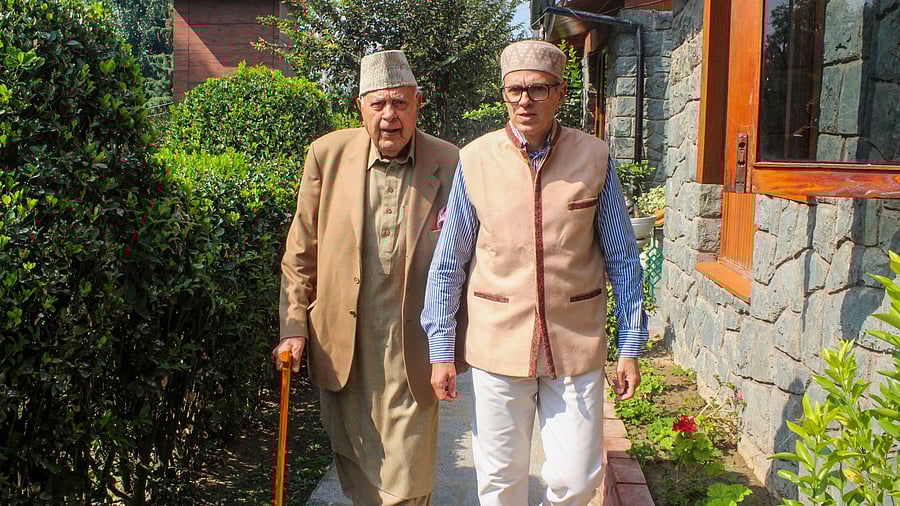 <div class="paragraphs"><p>Jammu & Kashmir National Conference (JKNC) President Farooq Abdullah with his son and party Vice President Omar Abdullah.</p></div>