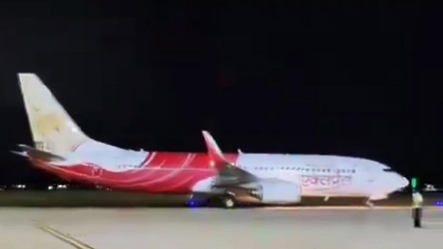 <div class="paragraphs"><p>Air India flight after it landed safely following a mid-air glitch, at the Trichy Airport.</p></div>