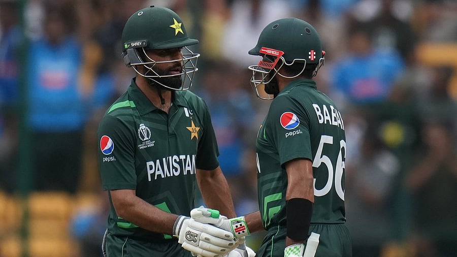 <div class="paragraphs"><p>Bengaluru: Pakistan's batter Fakhar Zaman with teammate Babar Azam</p></div>