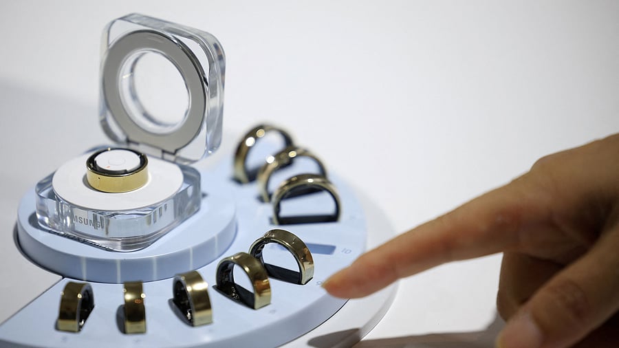 <div class="paragraphs"><p>File Photo: An attendee films Samsung Electronics' Galaxy Smart Ring during its unveiling ceremony in Seoul, South Korea, July 8, 2024.  REUTERS/Kim Hong-Ji</p></div>