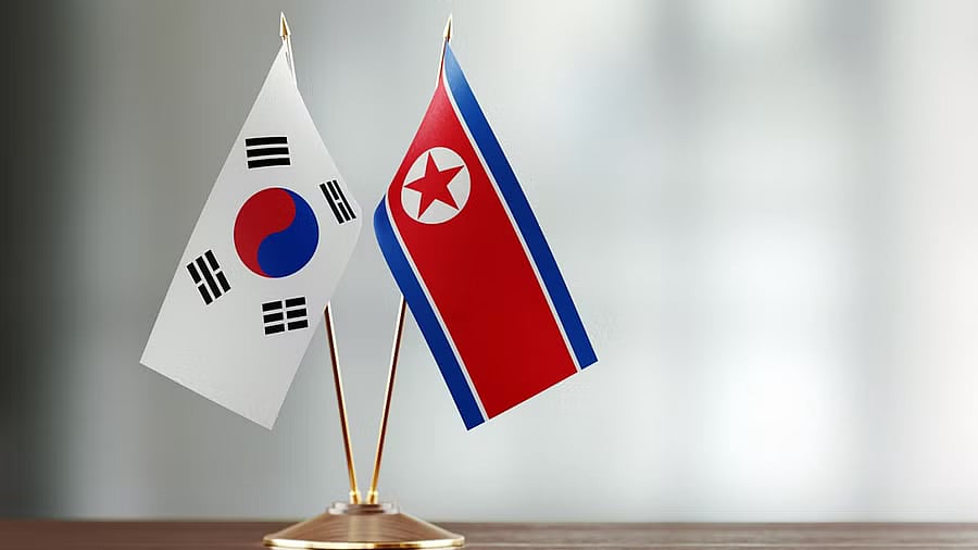 <div class="paragraphs"><p>South Korea and North Korea flags.</p></div>