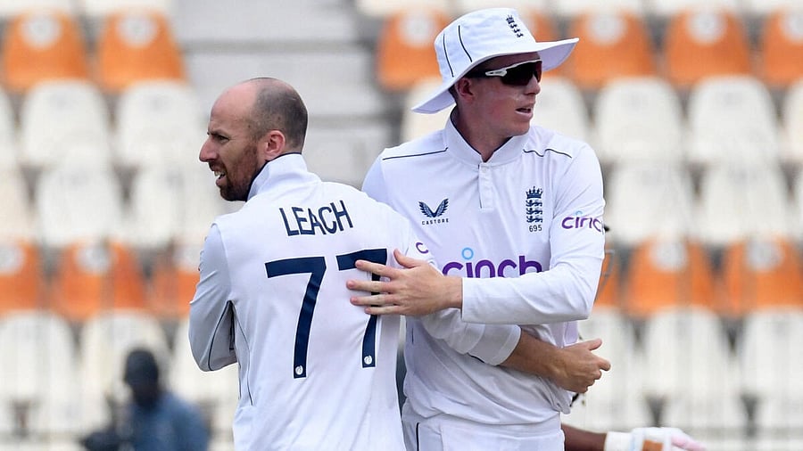 <div class="paragraphs"><p>England's Jack Leach (left) celebrates with Zak Crawley after dismissing Pakistan's Sajid Khan. </p></div>