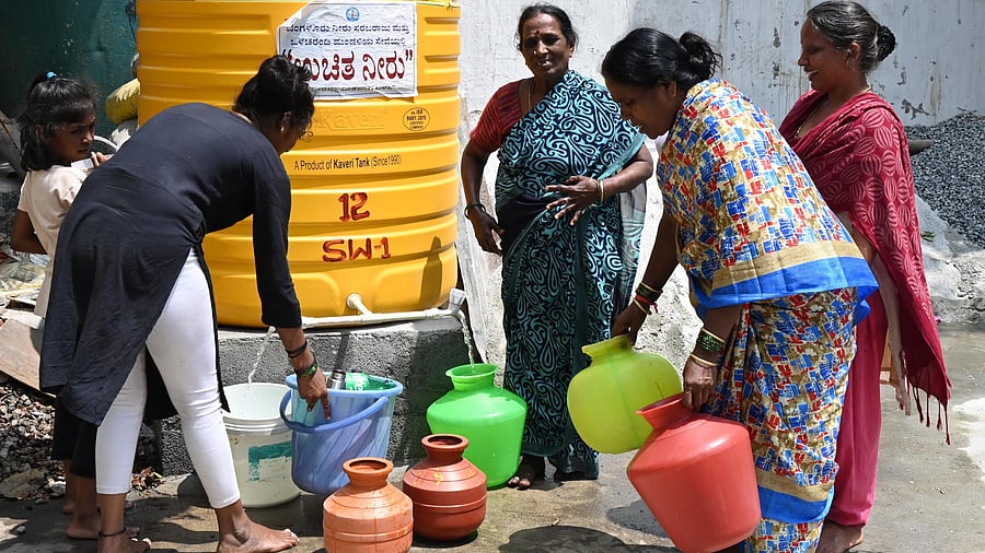 <div class="paragraphs"><p>Women fill water amid a water crisis in Bengaluru. </p></div>