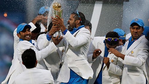 <div class="paragraphs"><p>India's players celebrate with the trophy after their win against England at the end of their ICC Champions Trophy final cricket match at Edgbaston cricket ground in Birmingham, England. </p></div>