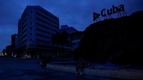 <div class="paragraphs"><p>People gather in a plaza as Cuba is hit by an island-wide blackout, in Havana, Cuba. </p></div>