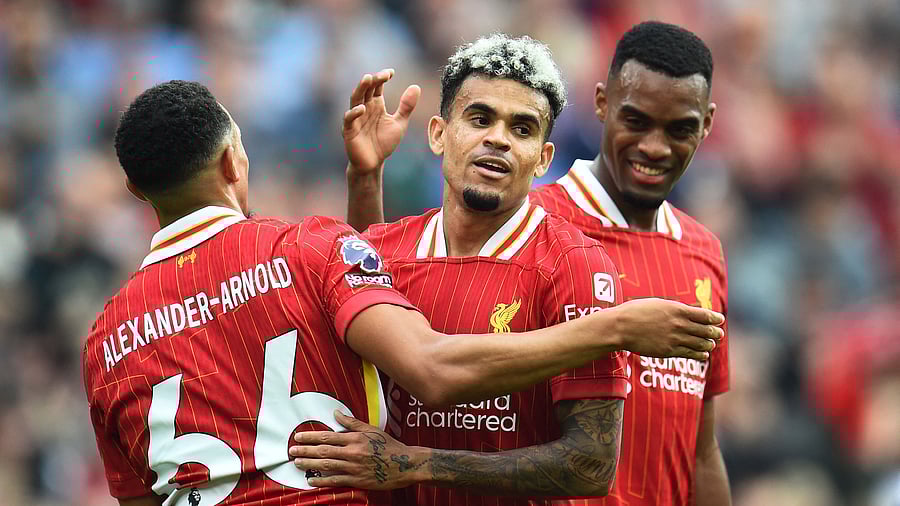 <div class="paragraphs"><p>Liverpool full-back Trent Alexander-Arnold (L) with Luis Diaz (C) and Ryan Gravenberch (R).</p></div>