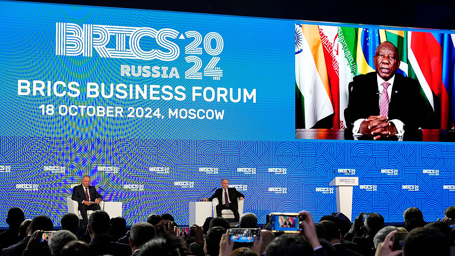 <div class="paragraphs"><p>Russian President Vladimir Putin listens to South African President Cyril Ramaphosa speaking via a video link during the BRICS Business Forum in Moscow.</p></div>