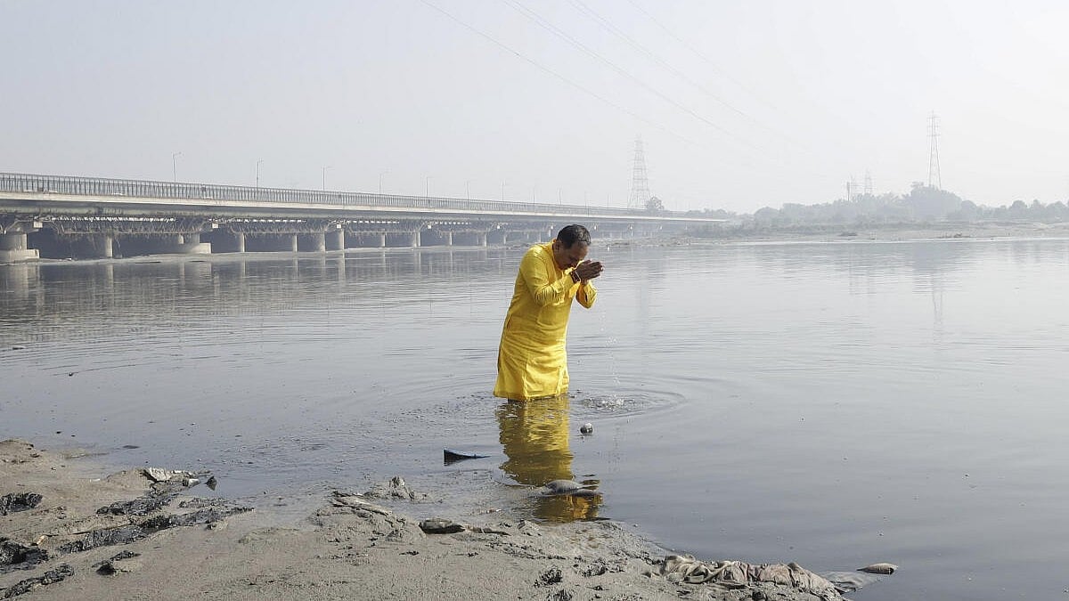Yamuna pollution: Delhi BJP chief takes dip in river water to mock AAP ...
