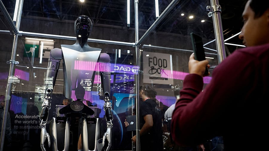 <div class="paragraphs"><p>A Tesla Inc Optimus robot, also known as the Tesla Bot is pictured at the 2024 Paris Auto Show in Paris, France.</p></div>